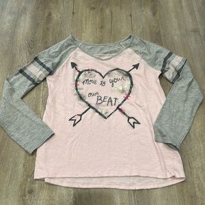 Girls Justice size 12 long sleeve t-shirt.